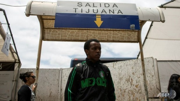 an-unidentified-migrant-from-guinea-bissau-walks-on-the-mexican