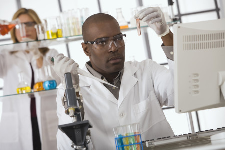 Scientist experimenting in lab