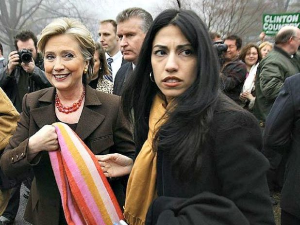 huma-abedin-with-hillary-robyn-beckafpgetty-640x480