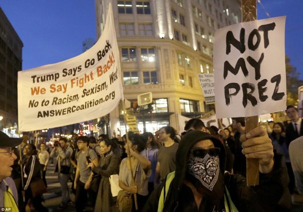 3a37c50e00000578-3922098-san_francisco_demonstrators_carrying_placards_march_on_market_st-a-16_1478785325495
