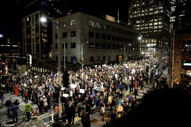 3a37c85000000578-3922098-seattle_thousands_of_people_march_through_seattle_against_donald-a-23_1478776851436