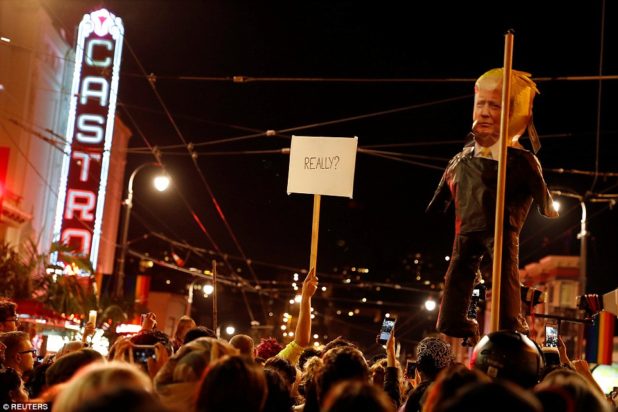3a37f1f400000578-3922098-san_francisco_effigies_of_trump_were_held_up_along_with_signs_re-a-26_1478778493541