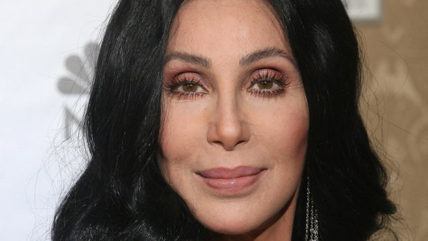 Cher poses in the photo room at the 67th