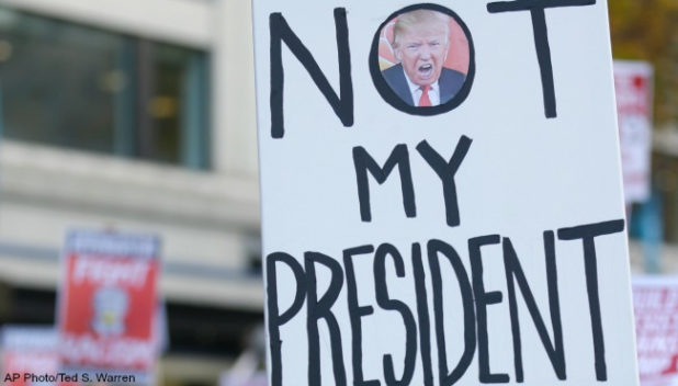 not-my-president-protest-sign-110916-ap