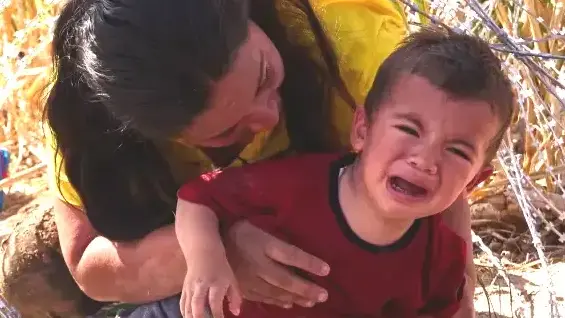 Shitty Migrant Mothers Force Kids Through Razor Wire for Photo-Op