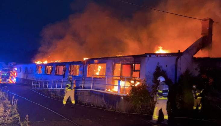 Ireland: Another Building Planned to House Invaders Set on Fire