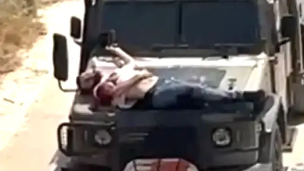 IDF Filmed Driving Around with Rando Palestinian Man Strapped to the Front of a Jeep
